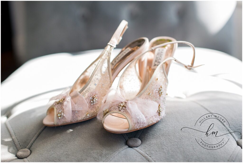 Brides heels on a ottoman.