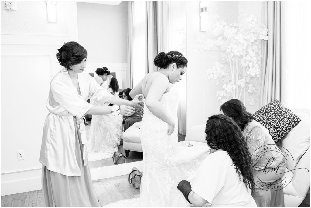 Bride getting ready with bridesmaids.