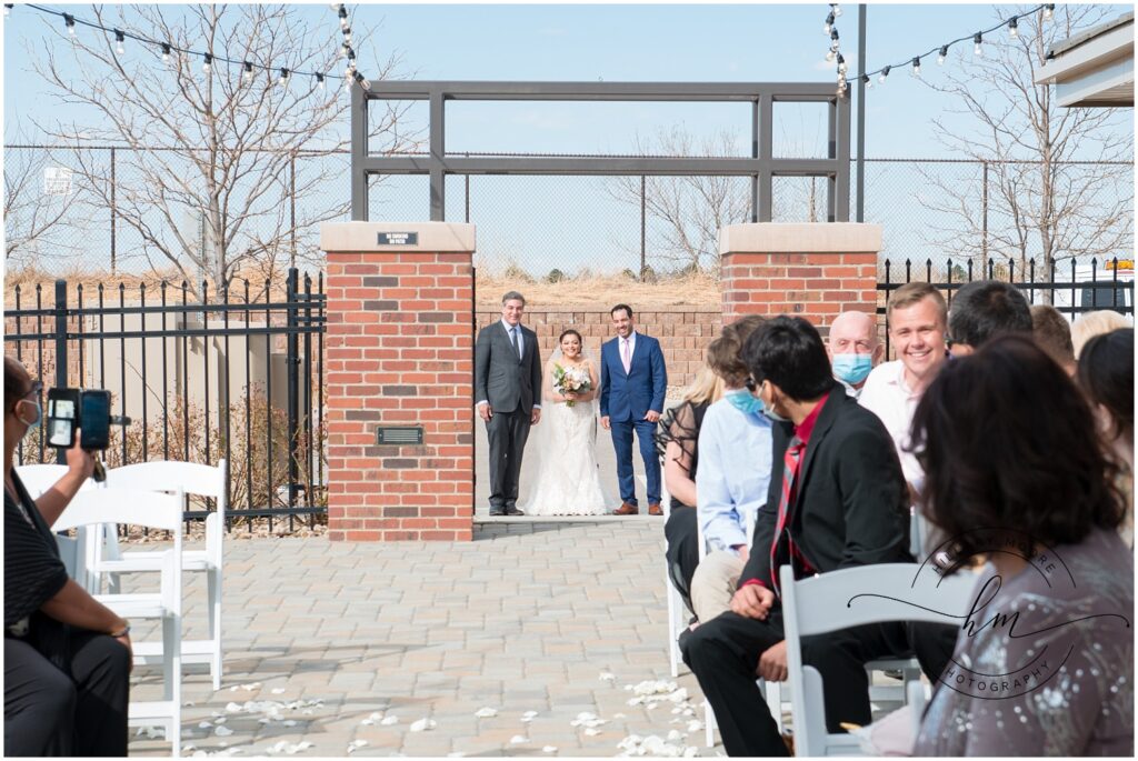 Bride waiting to walk down the aisle.