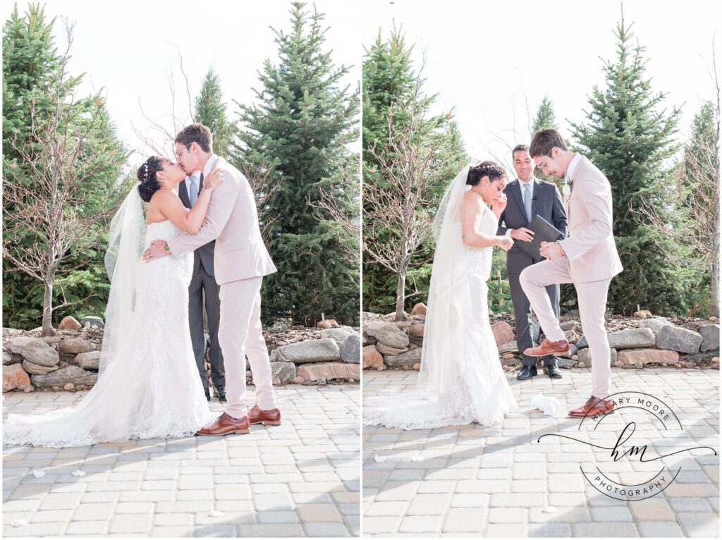 Bride and groom kissing.