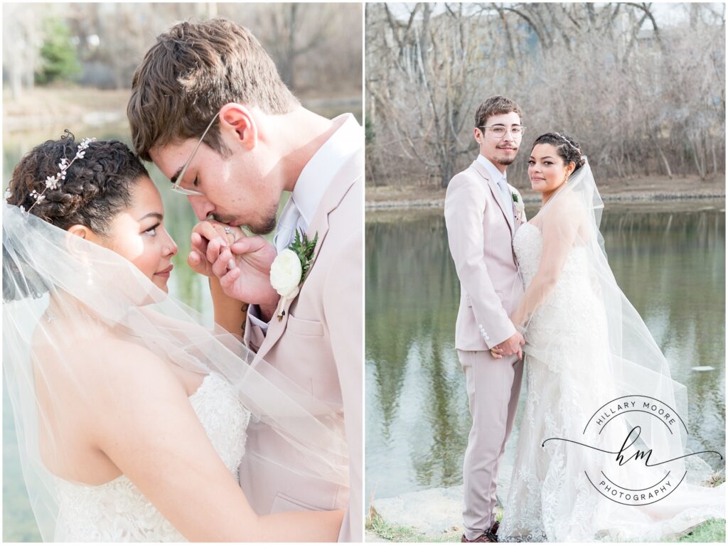 Groom kissing brides hand.