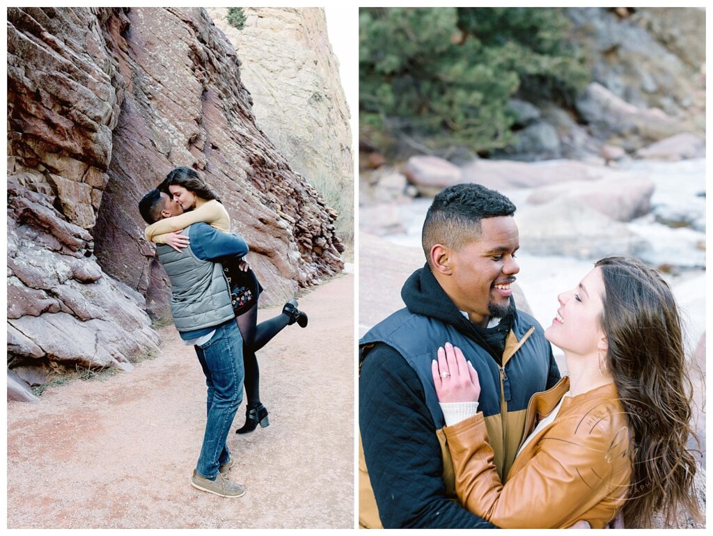 couple kissing by rocks