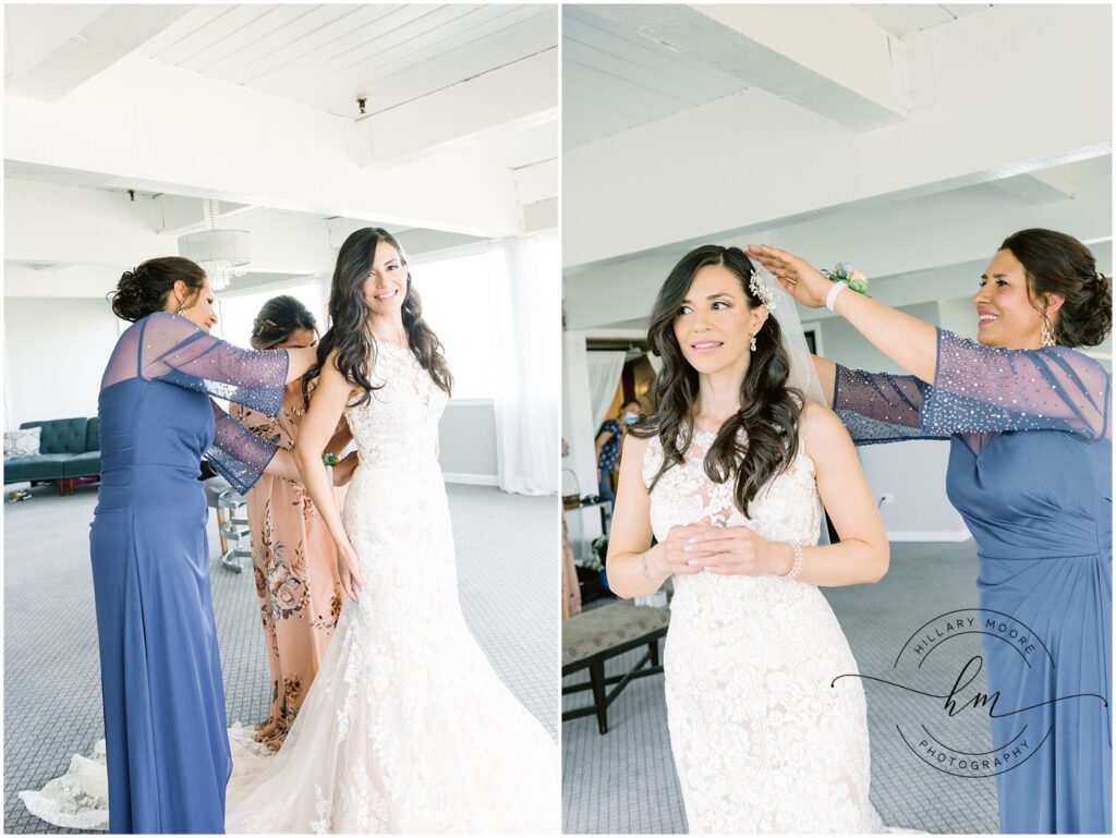 Women help the bride put on her veil and get ready for the wedding.